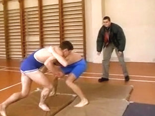 Gay wrestlers show off and wank their wieners