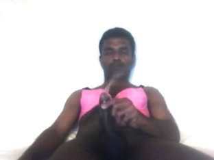 Indian boy in bra and thong peeing on his own face