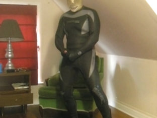 wetsuited lucha libre with skeleton and pantyhose stocking mask