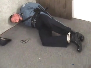 DILF trooper handcuffed gagged and struggling.