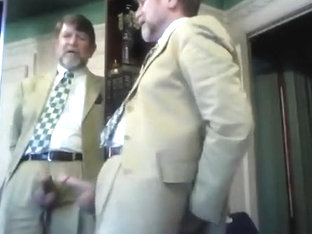 SUITED DAD DISCHARGES LOUD LOAD!