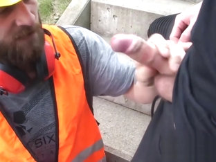 Bearded cock sucker orally services a big one for cash