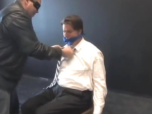 BG Hot beefy executive bound, gagged and stripped