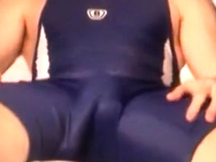 jerk off in blue wrestling gear