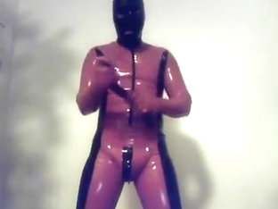 Latex Boy in Rubbersuit cum with Rubber Dildo