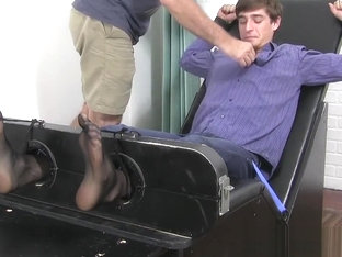 Young stud Logan N restrained for rough feet tickling