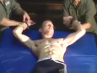 Restrained jock Slava tickled by foot fetish duo